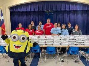 SA YES School Supply Distribution Back to Basics Project volunteers with minion